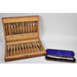 An Edwardian Oak Cased Set of Twelve Fish Knives and Forks, Union Case, Together with a Late 19th