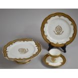 A 19th Century Porcelain Cup and Saucer decorated with Gilt and Black Trim having Monogram, Together