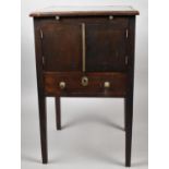 An Edwardian Mahogany Side Cabinet with Brushing Slides, Central Cupboards and Base Drawer,