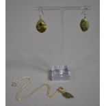 A Moldavite Meteorite Pendant and Galaxy Jasper Earrings