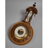 A Late Victorian/Edwardian Walnut Cased Aneroid Wheel Barometer, with Carved Decoration, 42cm high