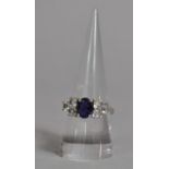 A Modern White Sapphire and Tanzanite Ladies Silver Dress Ring