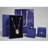 A Swarovski Scarab Beetle Ring and Necklace Both with Boxes, Bag and Original Receipt