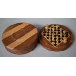 A Small Circular Circular Wooden Travelling Chess Set (Incomplete)