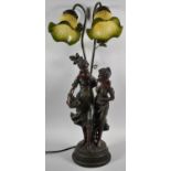 A Reproduction Bronze Effect Two Branch Figural Table Lamp on Circular Plinth Base, 67cm High