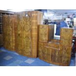 An Art Deco Burr Walnut Bedroom Suite Comprising Ladies and Gents Wardrobes, Oval Dressing Chest,
