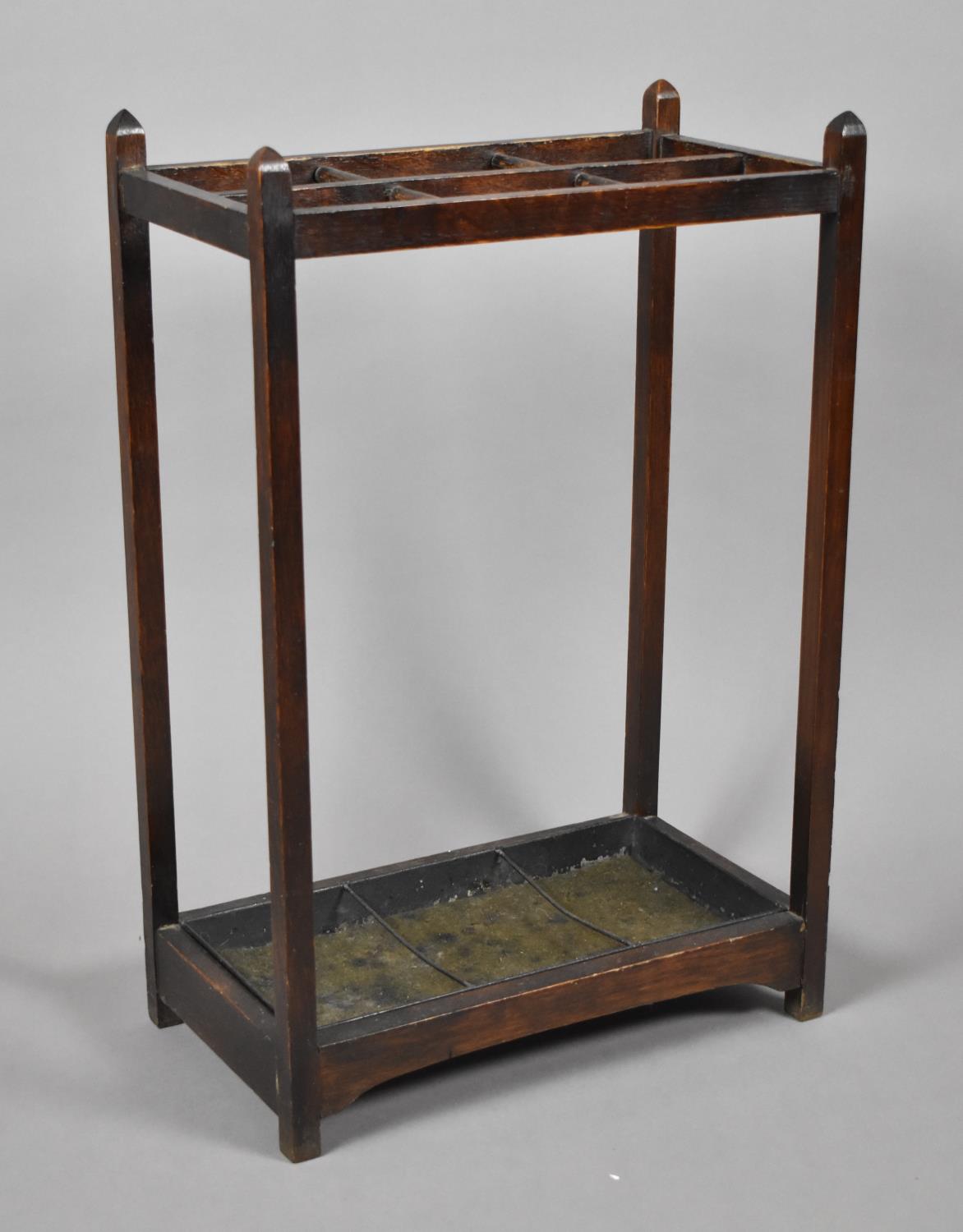 A Vintage Six Division Stick Stand