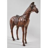 A Spanish Leather Souvenir in the Form of a Horse, 34cm high