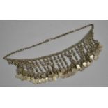 A Middle Eastern White Bib Necklace