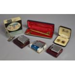 A Collection of Vintage Gillette Razors, Travel, Merlin Pen and Cufflink Set, Ronson Lighters (We
