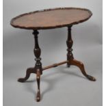 A Mid 20th Century Walnut Oval Topped Occasional Table, 60cm wide