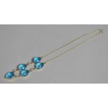 A Silver Far Eastern Necklace Having Five Faceted Shaped Blue Stones