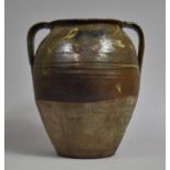 A Treacle Glazed Stoneware Two Handled Vase, 30cm high