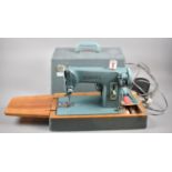 A Vintage Cased Electric Sewing Machine, Not Tested