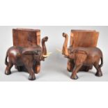 A Pair of Souvenir Carved Wooden Bookends in the Form of Elephants Beside Books, One Missing Tusk,