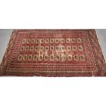 A Persian Patterned Woollen Rug, Possibly Baluchi, 189x122cms