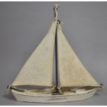 A Mid 20th Century Folk Art Pond Yacht with Canvas Sails and Wooden Hull. 42x13x42cms