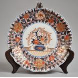 A 19th Century Oriental Porcelain Scalloped Edge Plate Decorated in the Imari Palette, Under Blue