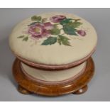 A Victorian Circular Walnut Framed Bobbin Shaped Footstool with Silk Embroidered Upholstery, Three