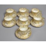 A 19th Century Porcelain Tea Set Decorated with Gilt Lacework and Scrolled Stylised Design to