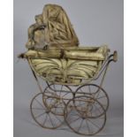 A Victorian Wrought Iron and Wicker Dolls Pram with Handles Either end, Detachable Hood and Inner