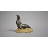 An Early 20th Century French Silvered Bronze Study of Seal Upon Naturalistic Carved Marble Base,