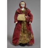 A Small Victorian Porcelain Head Doll with Original Velvet and Lace clothing