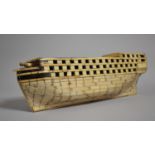 An 18th/19th Century Prisoner of War Bone Model of a Ship, the Hull with Bone and Wood Planks Pinned