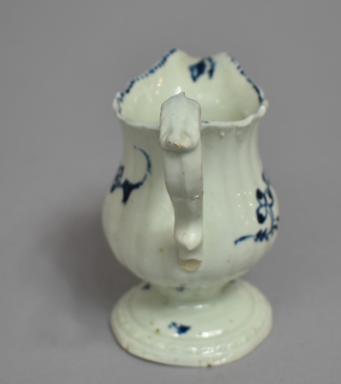 An 18th Century English Blue and White Porcelain Cream Jug, Floral Decoration, Condition Issues to - Image 3 of 7