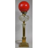 A Victorian Brass Oil Lamp, The Support in the Form of a Ribbed Corinthian Column on Stepped