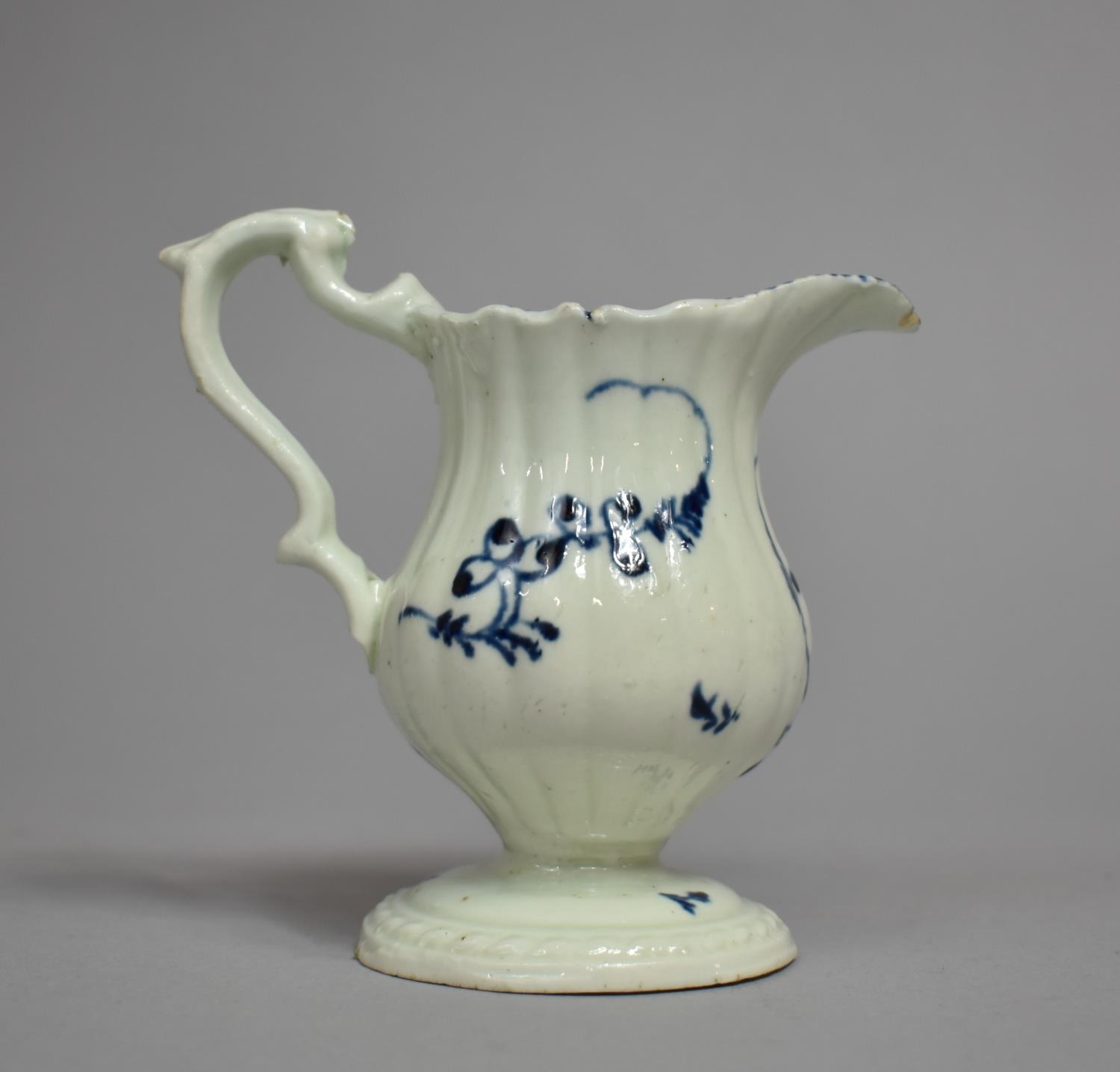 An 18th Century English Blue and White Porcelain Cream Jug, Floral Decoration, Condition Issues to