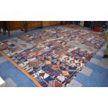 A Very Large Patterned Woollen Carpet Square, 476x295cm