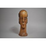 A Spanish Colonial Carved Hardwood Santos Head, 29cms High