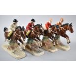 Two Pairs of Continental Ceramic Studies, Children on Horses, 18cm long
