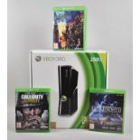 A Boxed Xbox 360, no Power and Untested Together with Three Xbox One Games