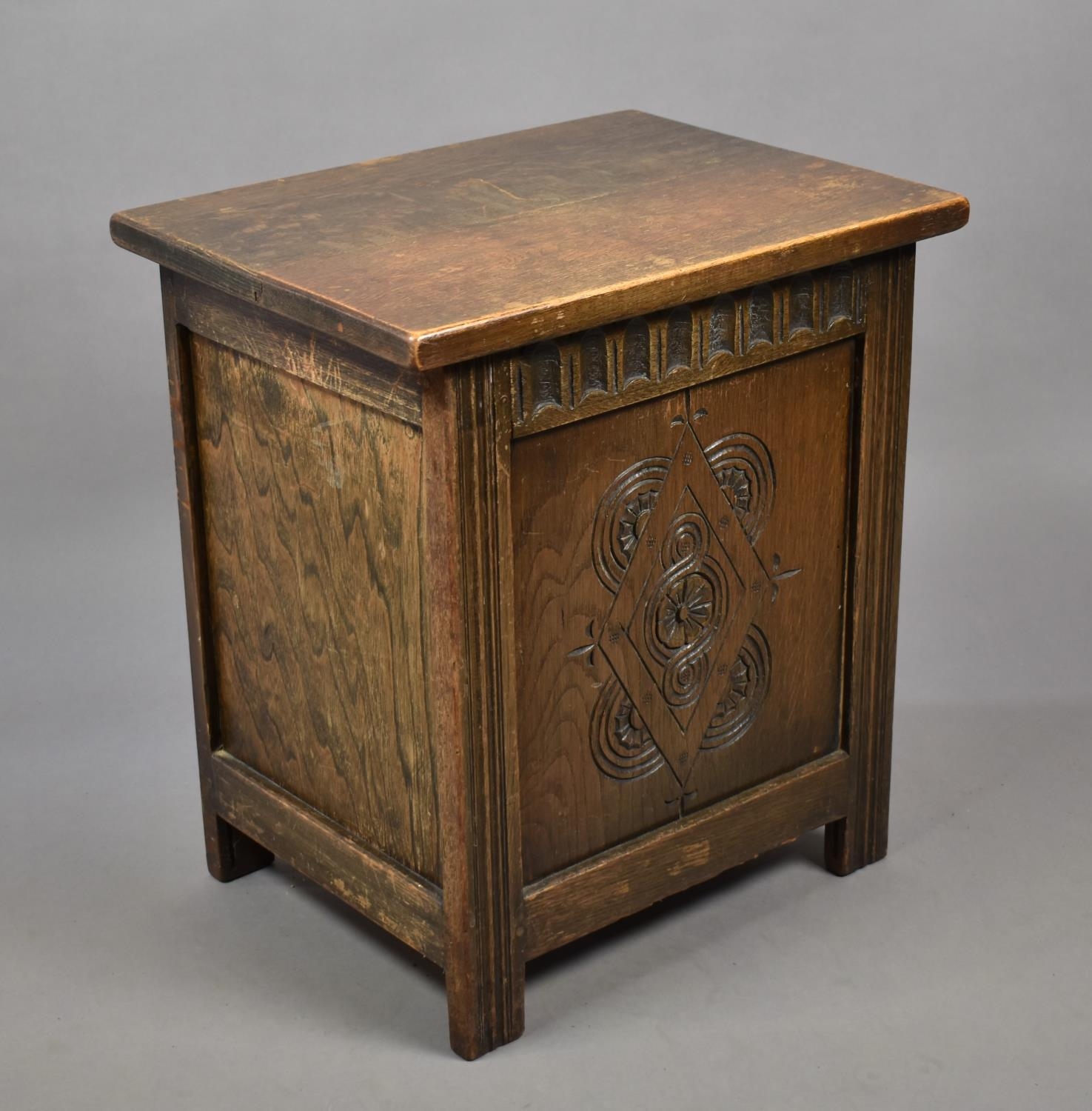 A Mid 20th Century Oak Lift Top Coal Box with Carved Decoration and Metal Liner and Shovel, 44cm