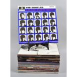 A Collection of 33rpm Records to include U2, Simple Minds, The Doors, The Cure, Smiths Etc
