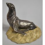 An Early 20th Century French Silvered Bronze Study of Seal Upon Naturalistic Carved Marble Base,