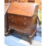 A Mid 20th Century Mahogany Fall Front Bureau with Fitted Interior and Three Base Drawers, Short