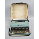 A Vintage Olivetti Lettera 32 Portable Manual Typewriter in Carry Bag