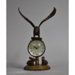 A Reproduction Bronze Novelty Desk Top Ball Clock with Eagle Finial with Out Stretched Wings and Two