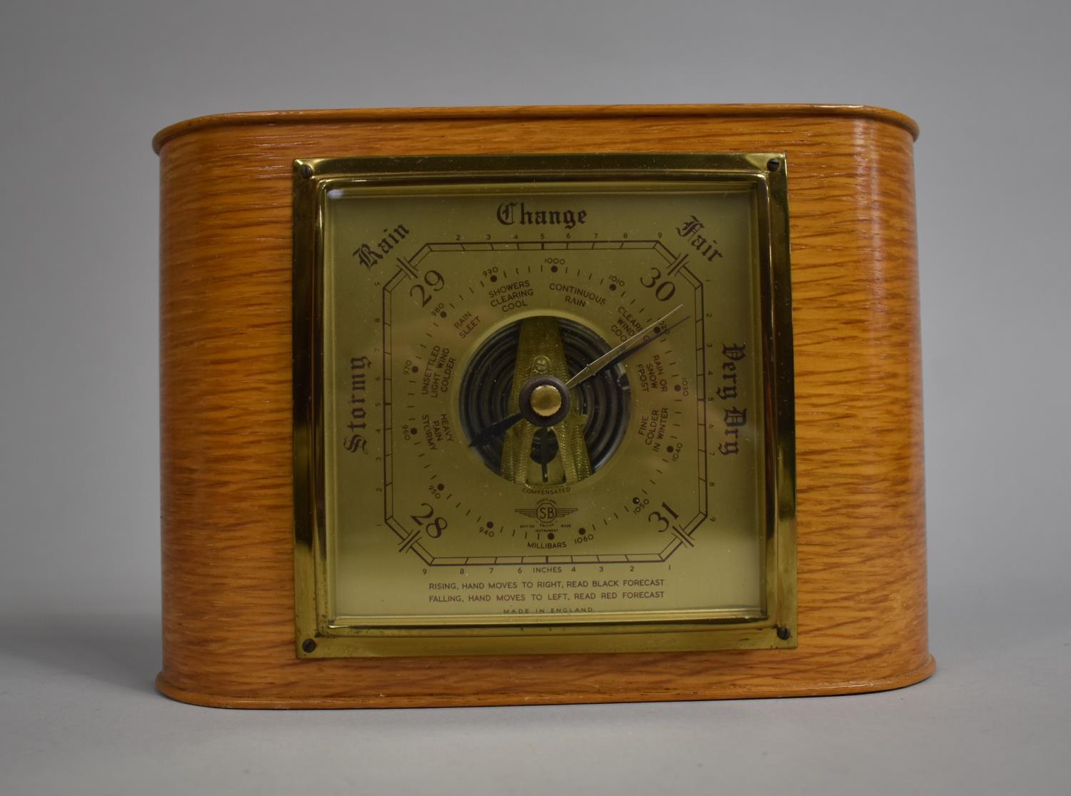A Mid 20th Century Shortland Compensated Wall Hanging Oak Cased Aneroid Barometer, 22cms by 15cms
