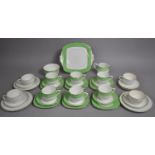 A Gilt and Green Trim Tea Set to comprise Six Cups, Six Saucers, Six Side Plates, Cake Plate, Milk
