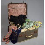 A Vintage Travel Bag Containing Various Vintage Clothing, Corset Type Piece etc