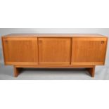 A 1970's Teak Sideboard with Sliding Doors, 181cm wide