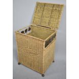 A Mid/Late 20th Century Woven Rectangular Clothes Basket with Hinged Lid, 45cm wide