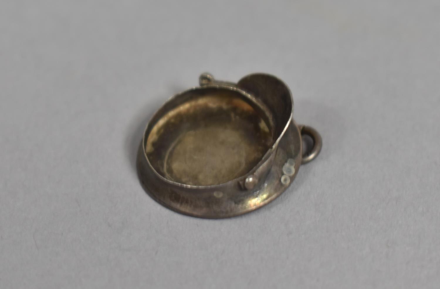 A Vintage Silver Charm in the Form of a Military Cap Stamped Sterling - Image 2 of 2