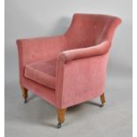 A Mid 20th Century Buttoned Upholstered Tub Armchair