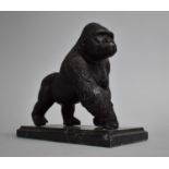A Patinated Bronze Study of a Gorilla, on Rectangular Marble Plinth, 20cms Long and 16cms High