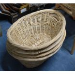 A Set of Four Oval Wicker Laundry Baskets, 59cm wide